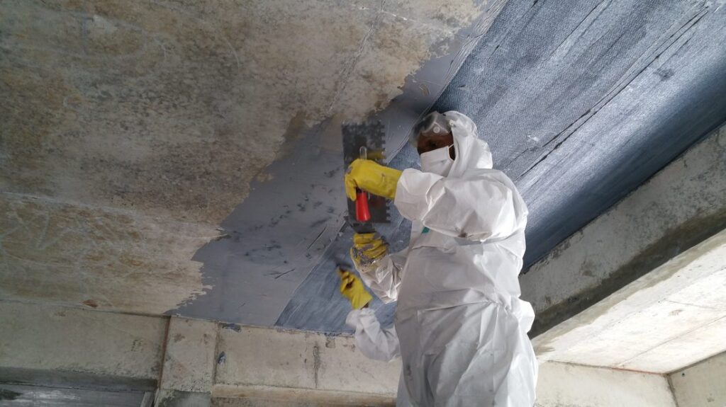 Rolling and Consolidating CFRP Fabric